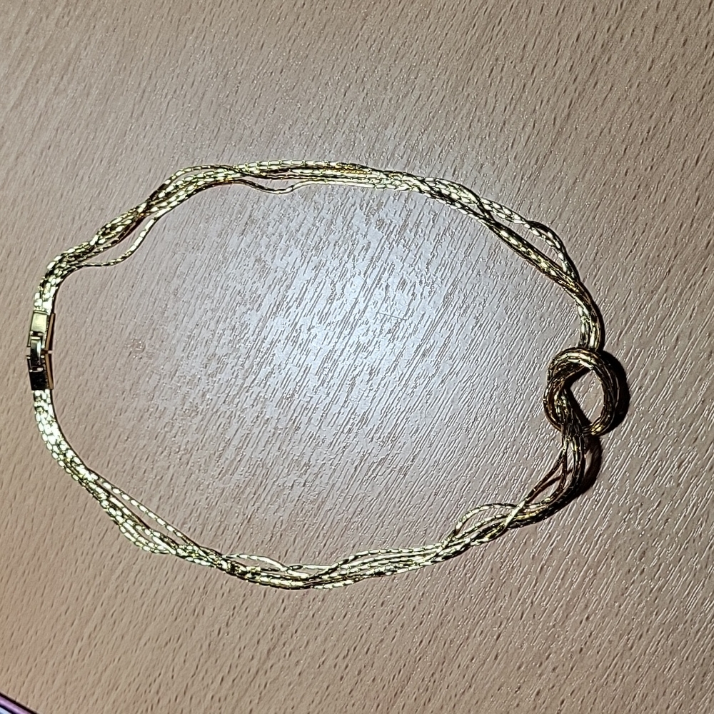 Multi Stand Love Knot in Gold Tone